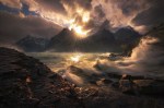 'Sunset over Waves and Rocks in Torres Del Paine' by Marc Adamus.